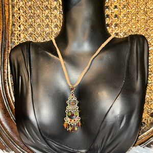 Premier Designs Gold and Red Necklace with Intricate Pendant